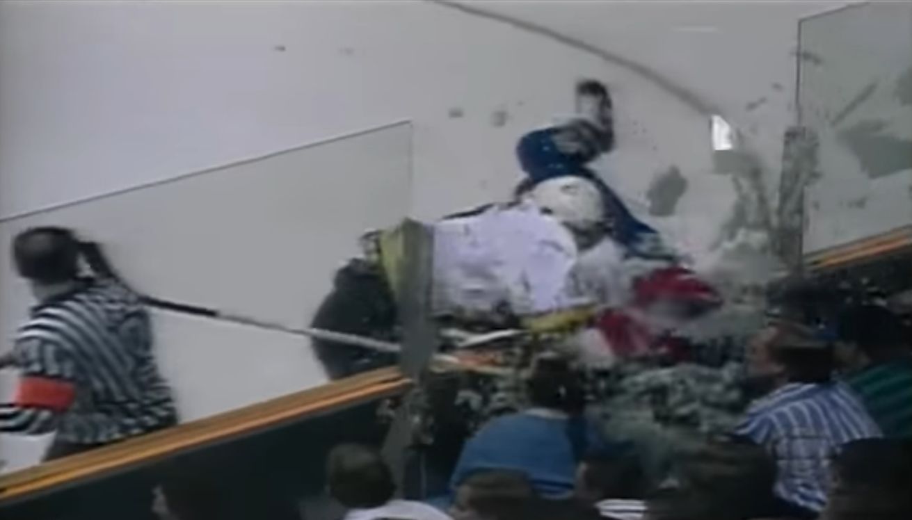 Playoffs, Game 4, 1995, Trevor Linden (Canucks) hammered Jeff Norton (Blues) out through the glass wall