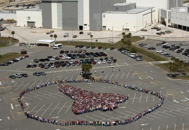 NASA Space Shuttle Masters around the Space Shuttle Silhouette in a Vibrating O# Formation
